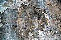 Fragment of ancient rock drawings on Sagan–Zaba cliff.