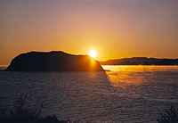 Lake Baikal. Sunrise over the Island of Tainak.