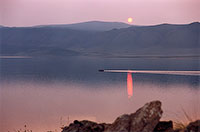 Lake Baikal. Sunset over the Primorskiy Range.